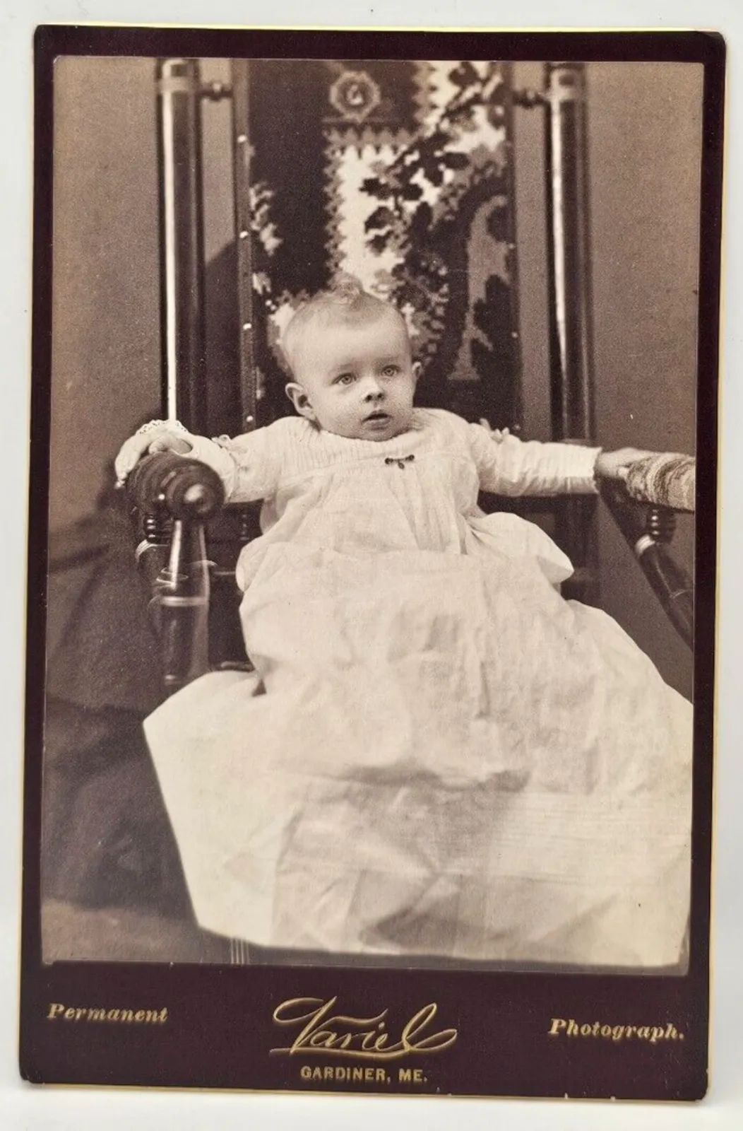 Product image for Antique Cabinet Card Of Baby In A Large Chair, Gardiner, Maine