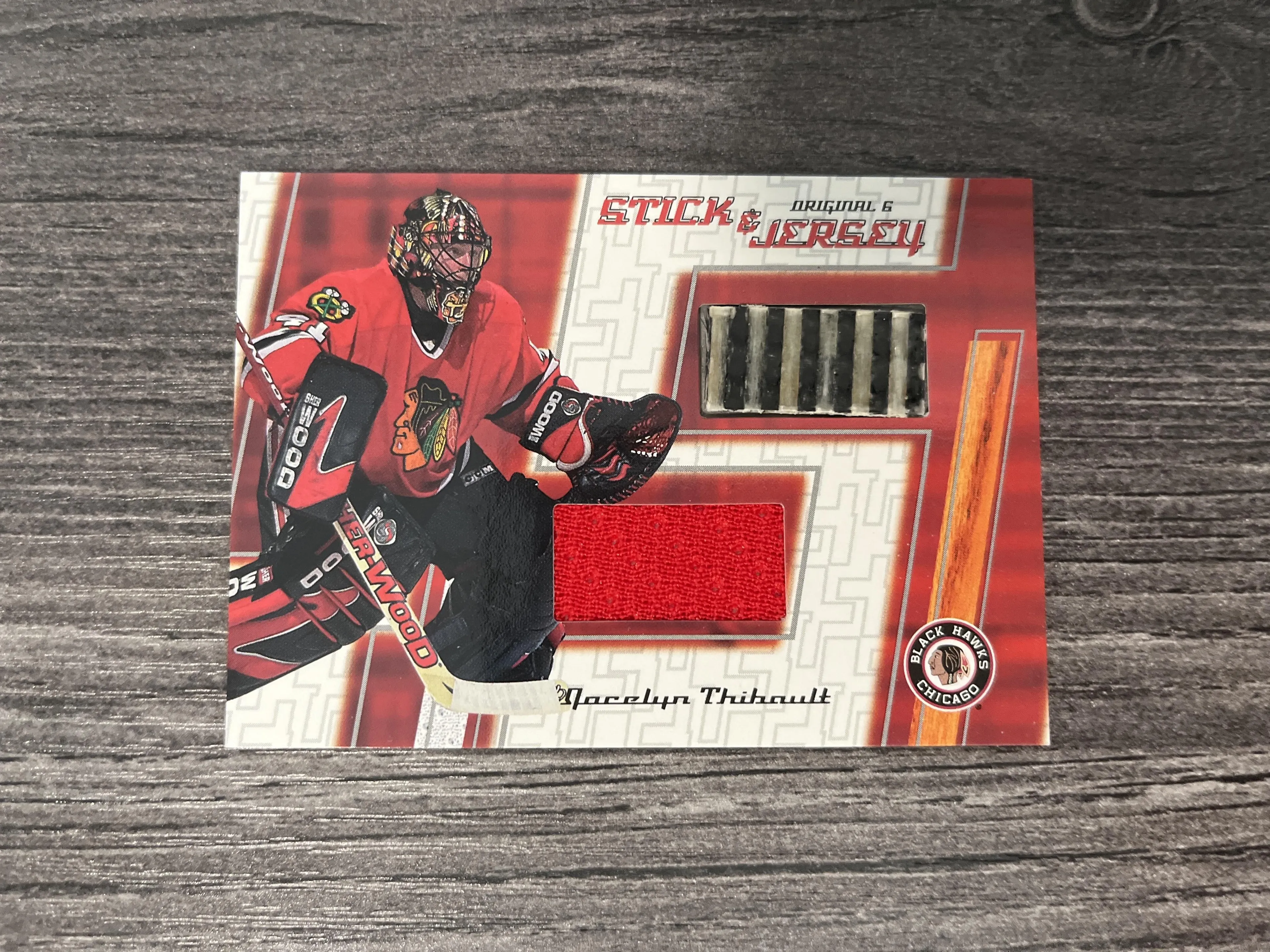 Product image for 2003-04 Parkhurst Original Six Jocelyn Thibault Stick & Jersey #CM-10 - Very Good - 2003 - Hockey - CM-10 - National Hockey League (NHL) - Parkhurst - Jocelyn Thibault - 2003-04 Parkhurst Original Six Chicago Blackhawks - Chicago Blackhawks - Stick & Jersey