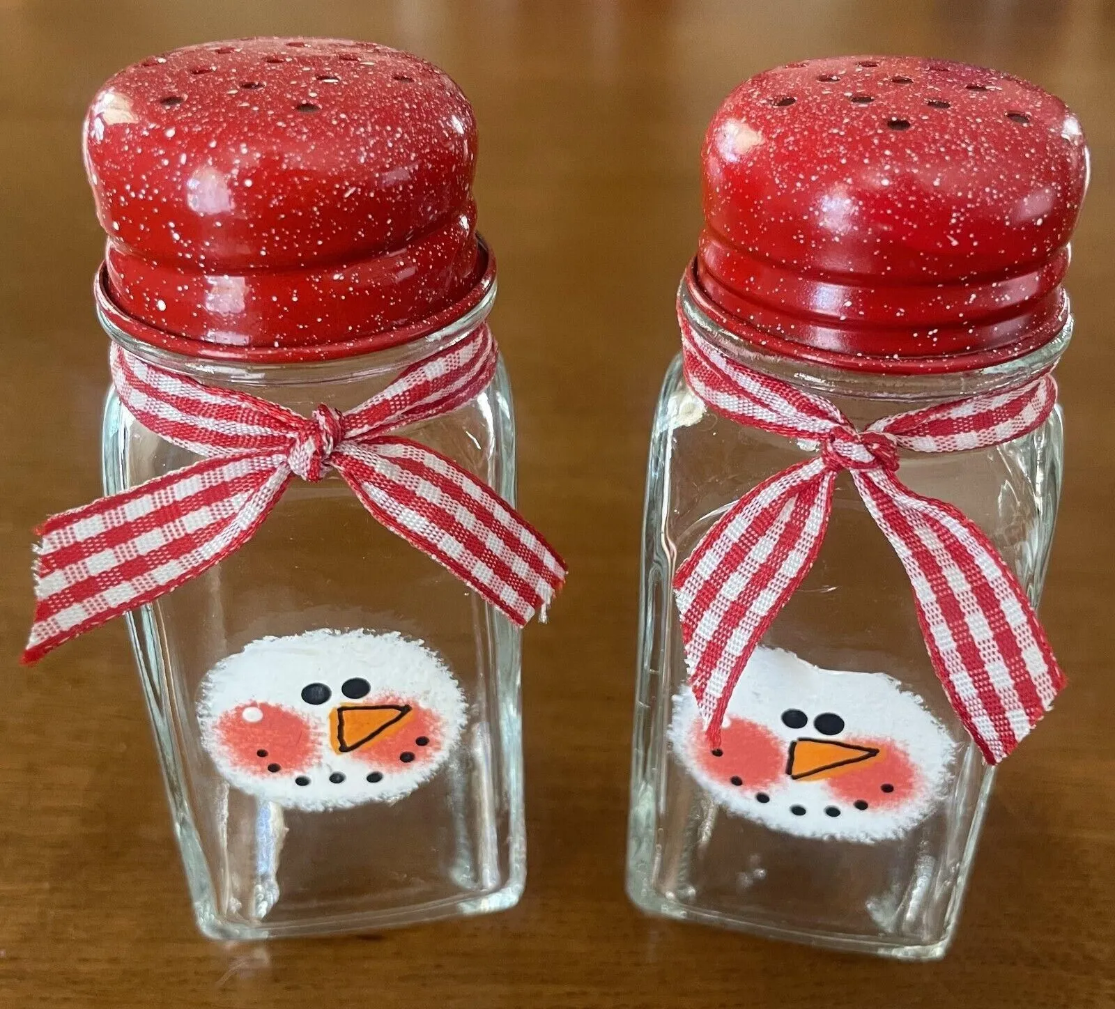 Product image for Snowman Salt and Pepper Shakers - Red Cap, Checkered Ribbon, Clear Glass 3.75"