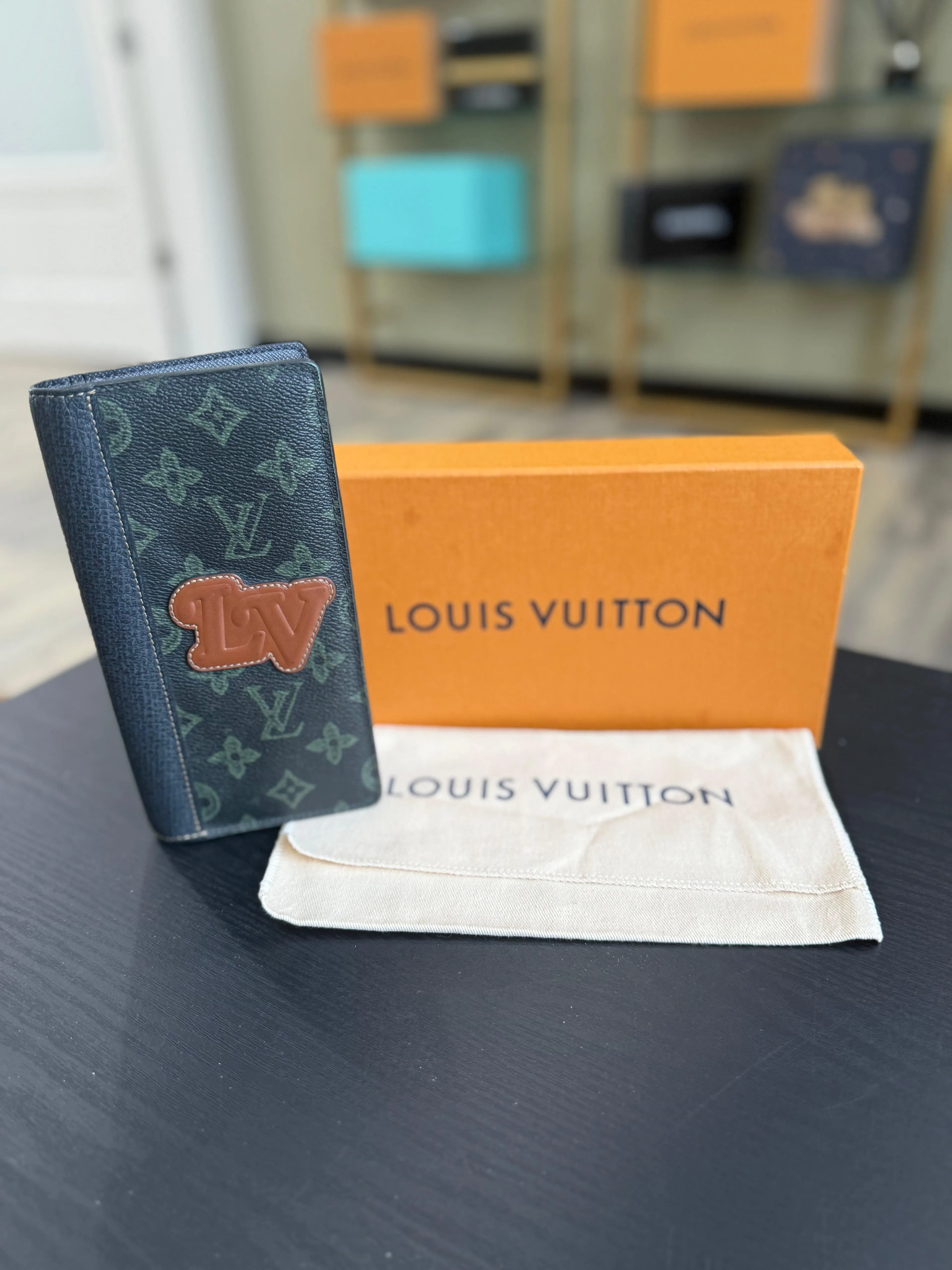 Product image for Louis Vuitton Limited Edition Green Monogram Brazza Wallet - Good
