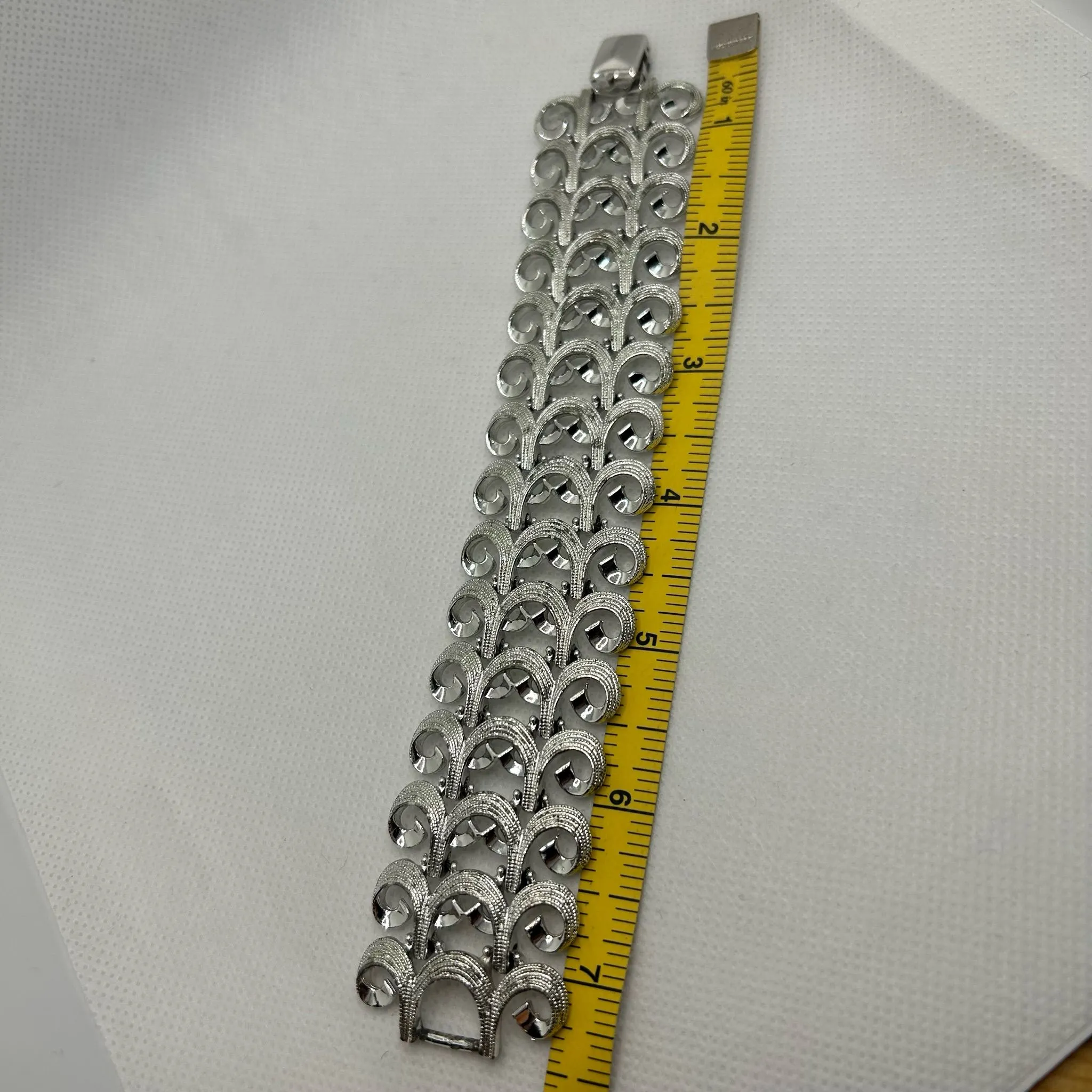 Product image for A12. Vintage Signed Kramer Wide Textured Silver Tone Swirl Design Bracelet