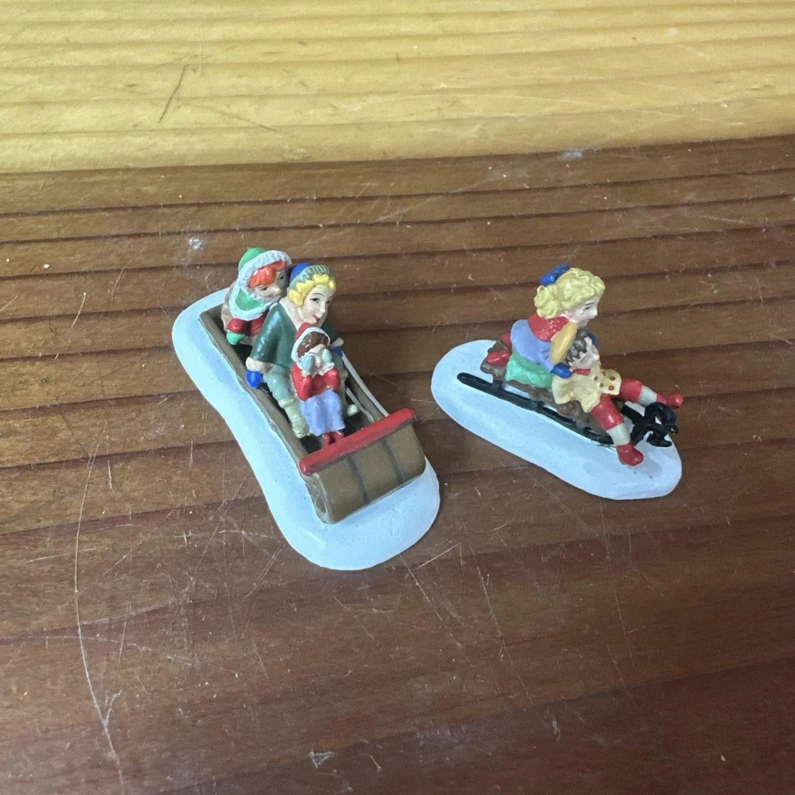 Product image for 1998 Dept 56 Seasons Bay Figurine Fun In The Snow #53323 In Box