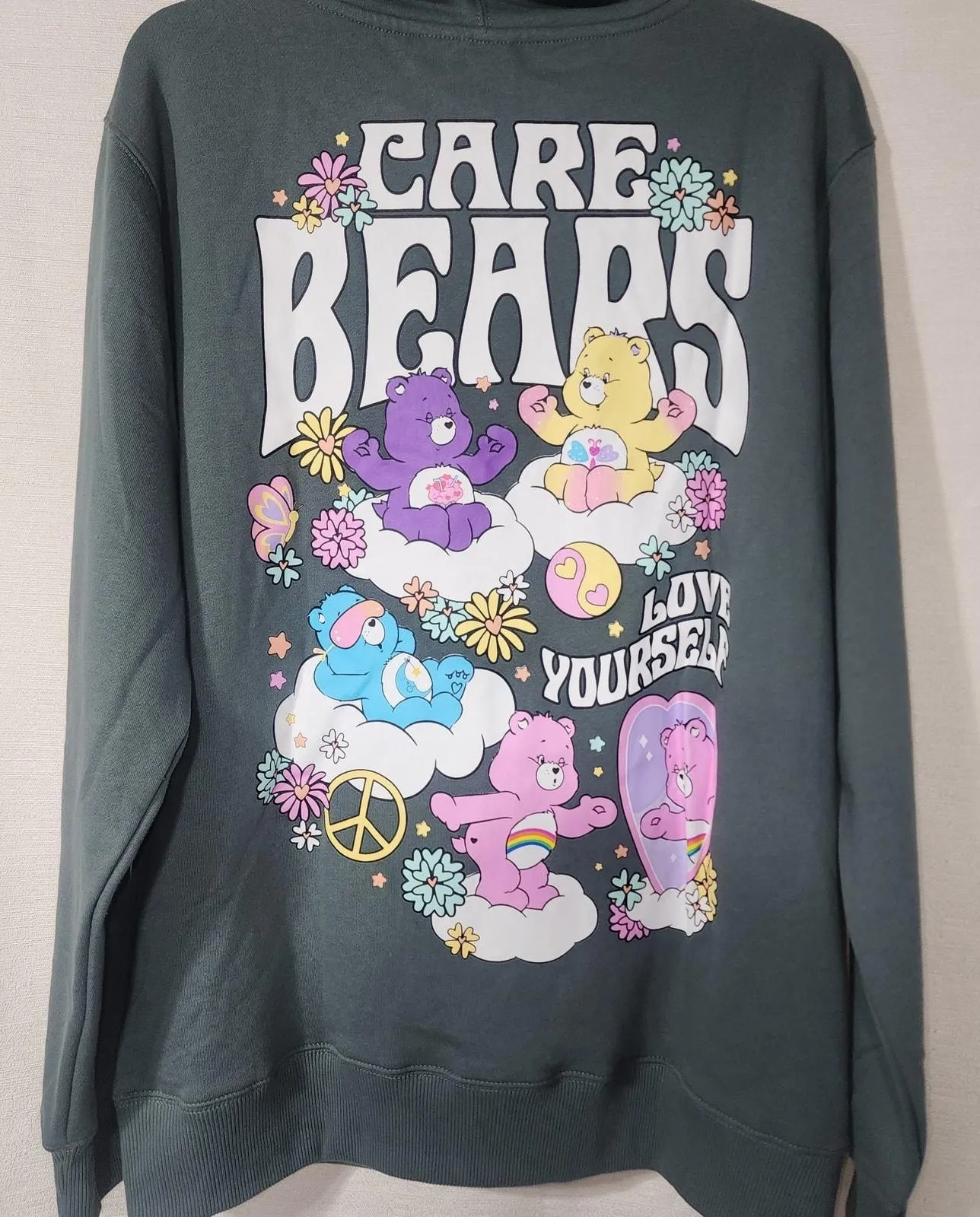 Product image for Care Bears '' Love yourself'' green hoodie size medium men