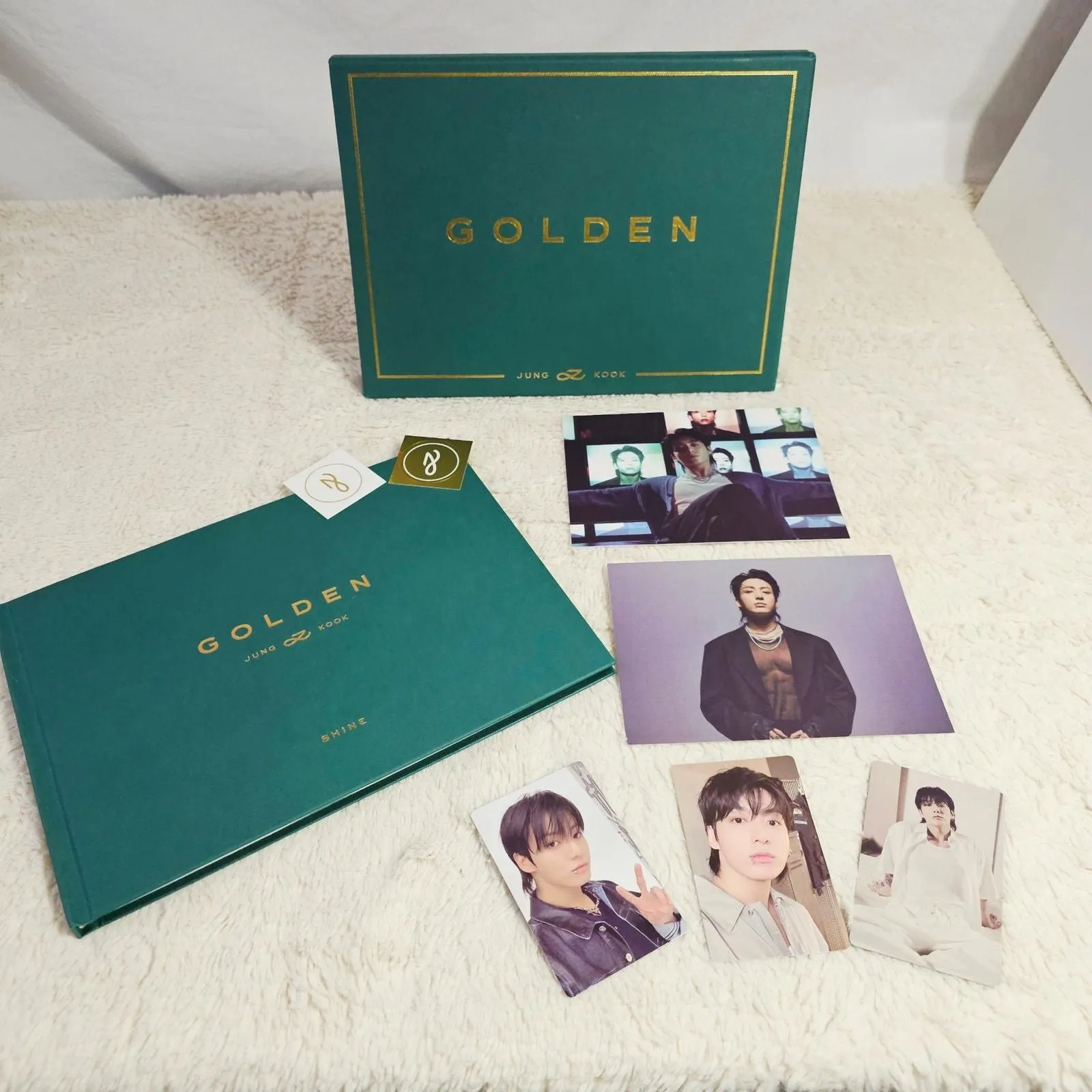 Product image for JUNGCOOK 1st Solo Album Book Shine. With poster, stickers and mini wallet cards