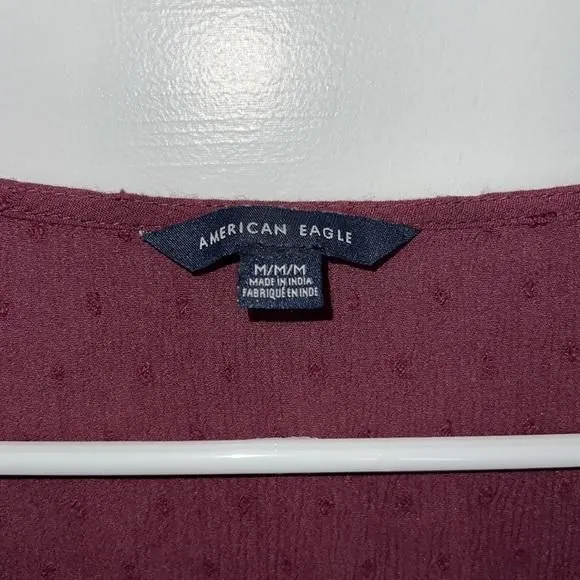 Product image for American eagle blouse peplum burgundy medium textured V-neck quarter sleeve