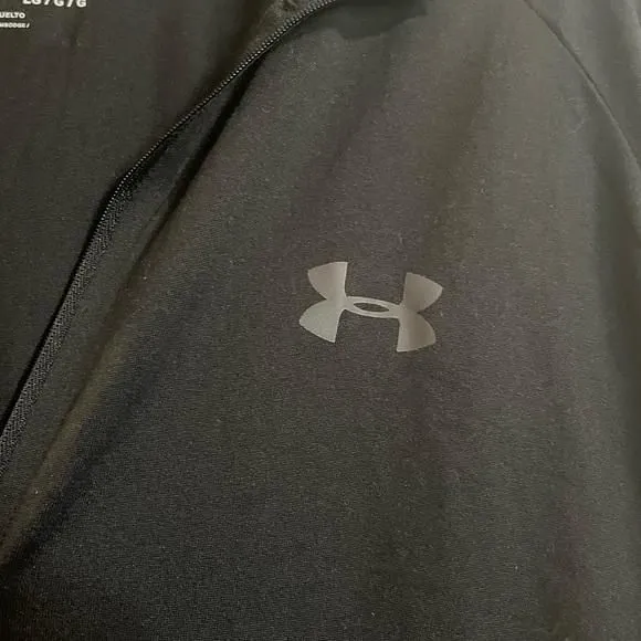 Product image for Under Armor pull over. Black. Loose fit.