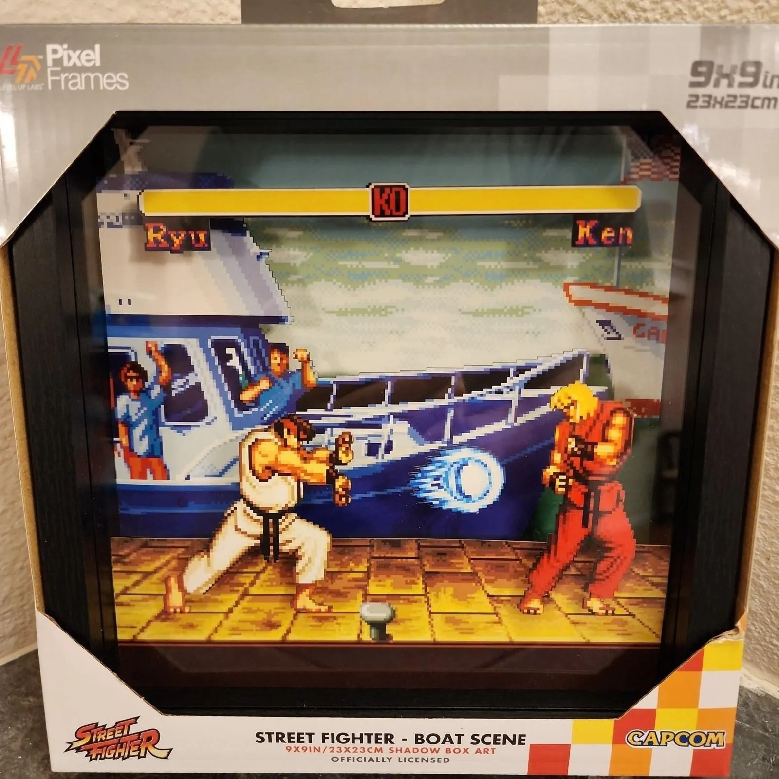 Product image for Pixel Frames - Street Fighter II, Boat Scene (NEW) 9" x 9" Framed Shadow Box Art