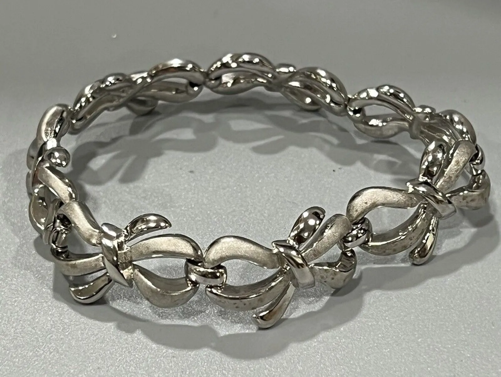 Product image for Vintage Crown Trifari Bow Ribbons Bracelet Silver Tone Bow Links 6.75"