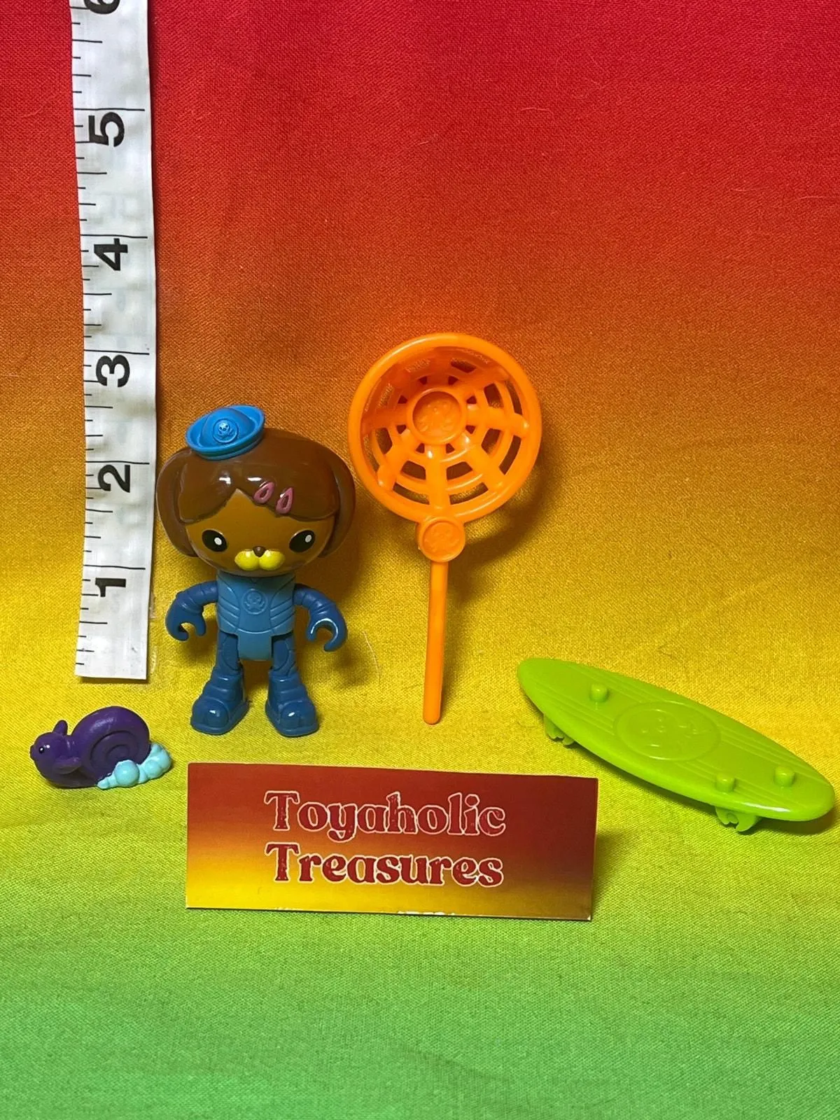 Product image for Fisher Price Octonauts Dashi & the Surfer Snail Action Figure