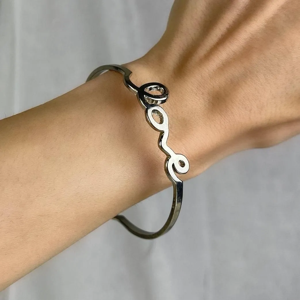 Product image for NWOT Silver Tone LOVE Cursive Bangle Bracelet Size OS One Size