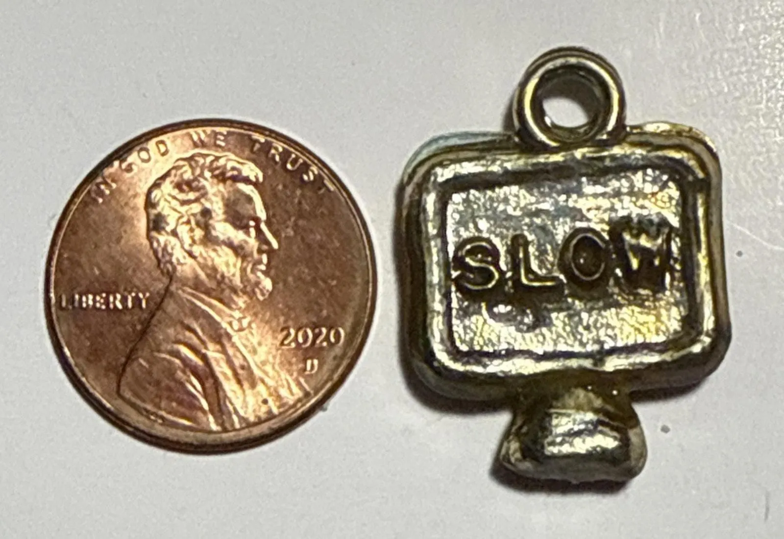 Product image for Vintage Gold Tone Metallic Cracker Jack SLOW Traffic Sign Charm 1L