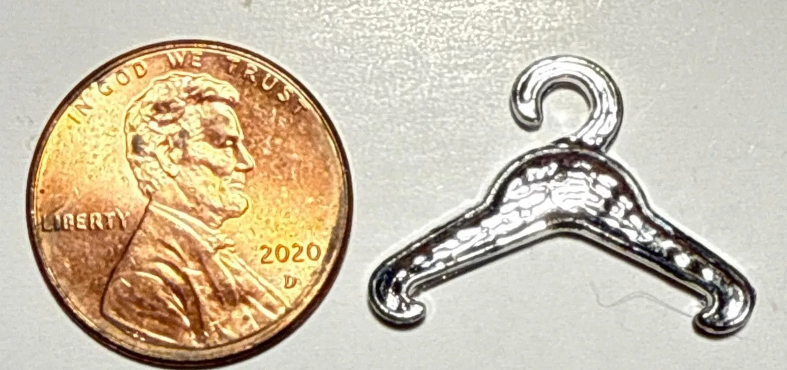 Product image for Vintage Silver Tone Metallic Cracker Jack Clothing Hanger Charm 1L