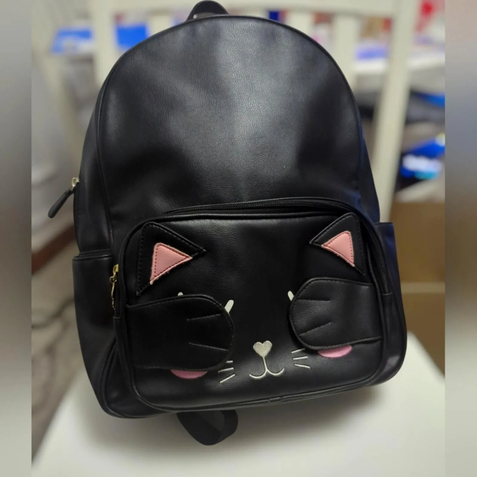 Product image for Black Cat Face Pick-a-Boo Medium Backpack