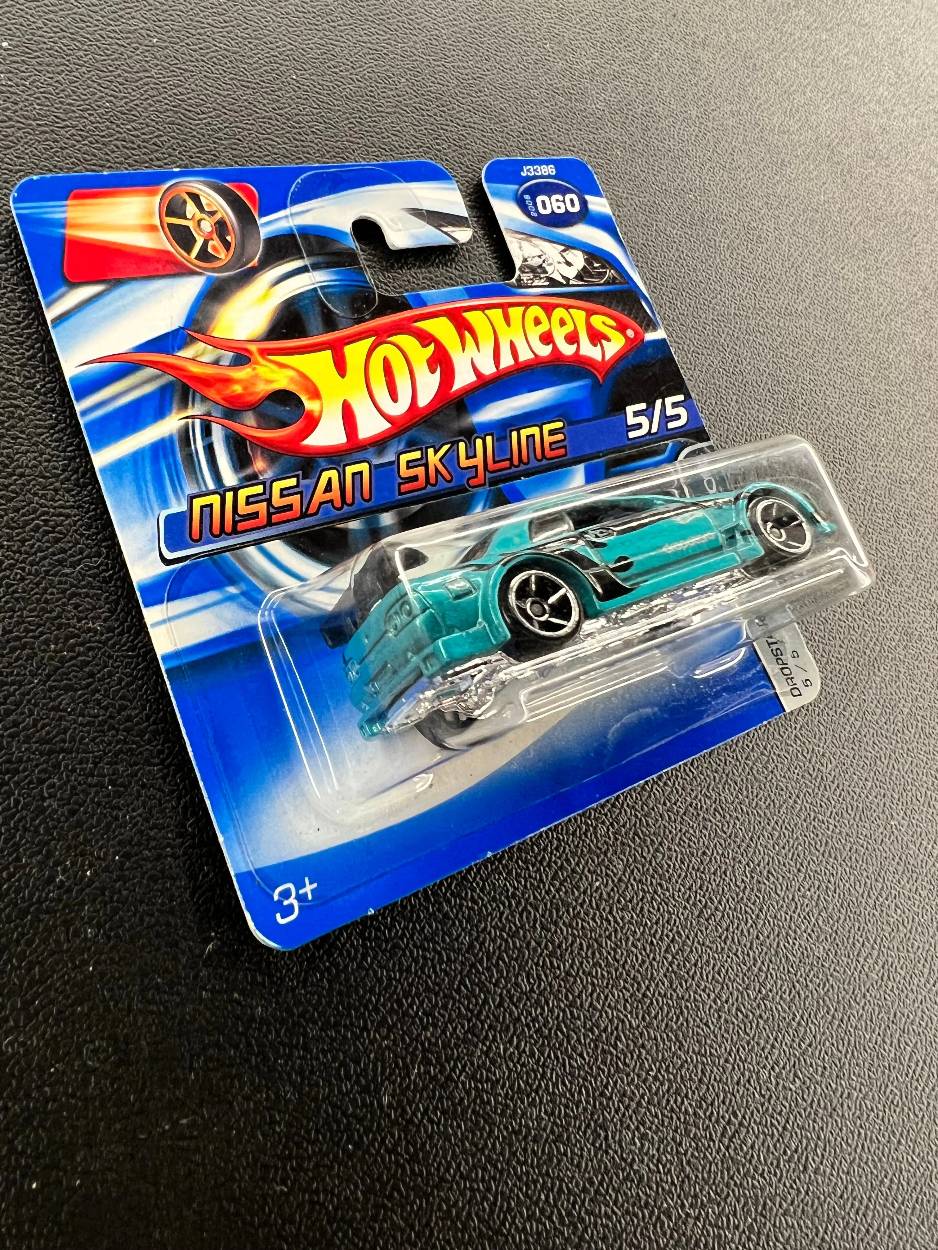 New 2007 Hot Wheels - Dropstars 2024 - Nissan Skyline - Teal on a Short Card