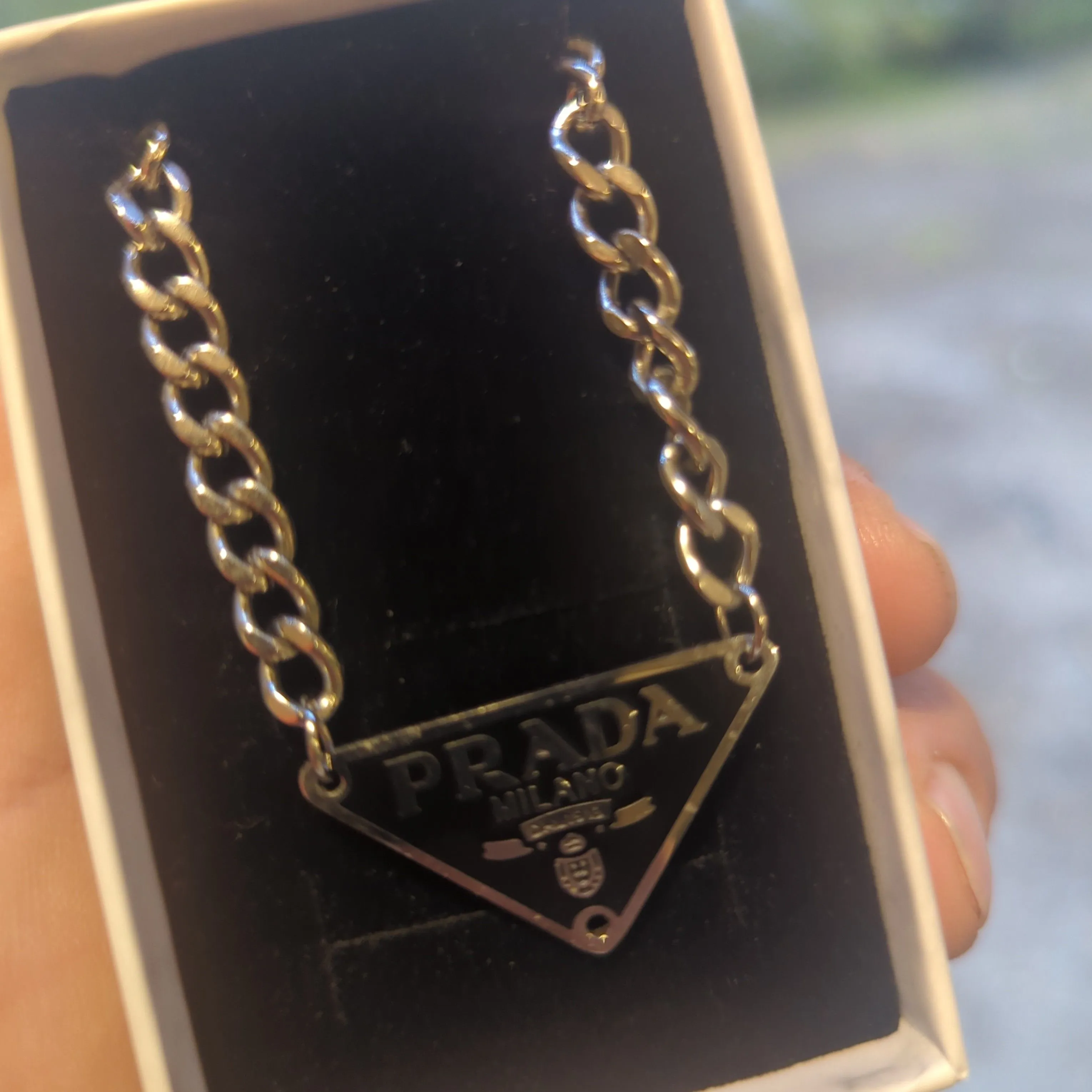 black Prada necklace · Whatnot: Shop, Sell, Connect