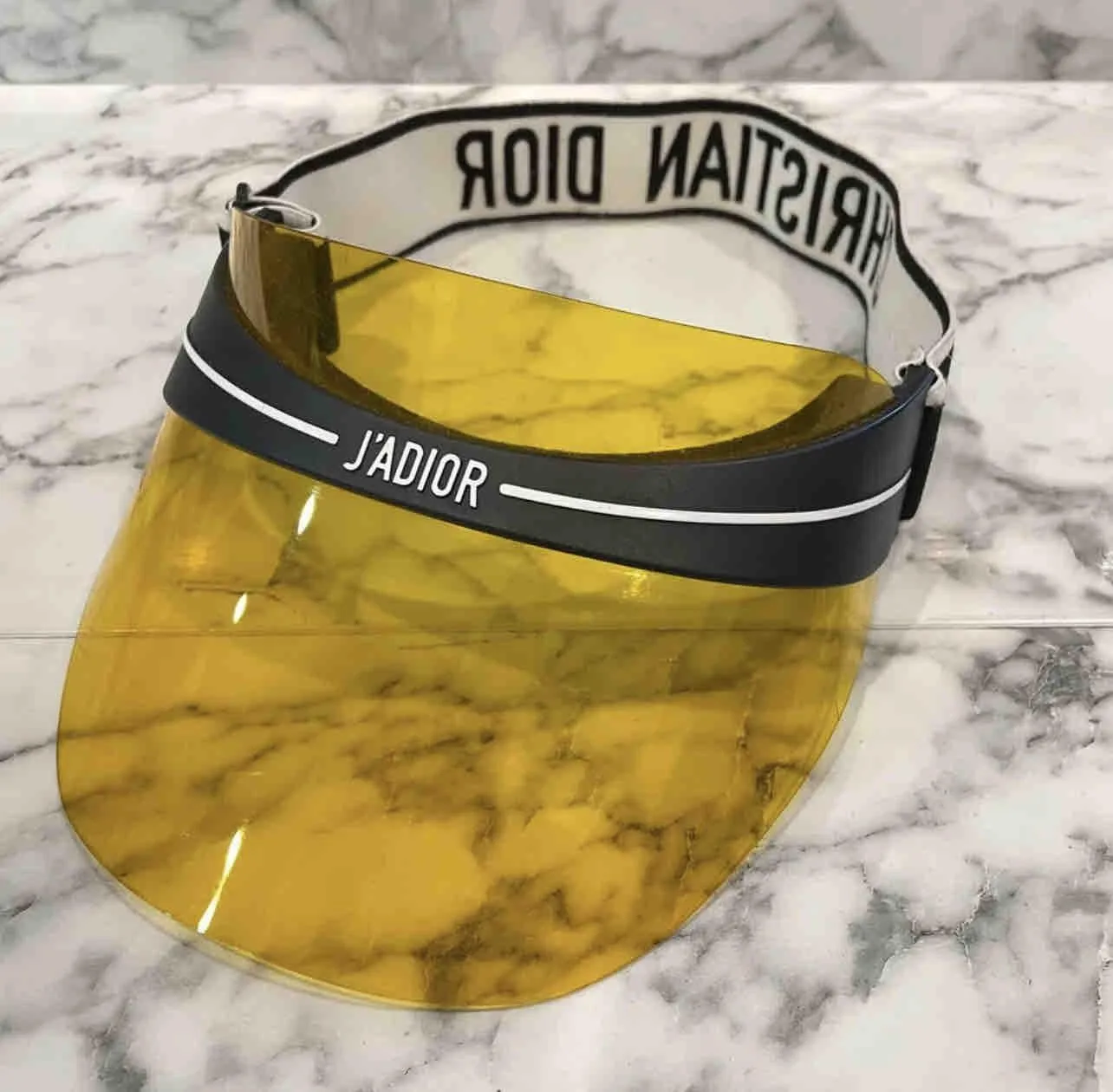 CHRISTIAN DIOR Yellow Dior Club 1 J ADIOR Visor Retail 430 Whatnot Buy Sell Go Live