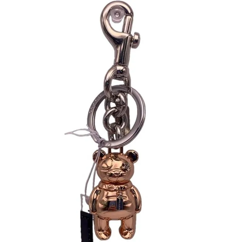 COACH Gift hotsell Box Teddy Bear Keychain Gold Bag Charm NWT