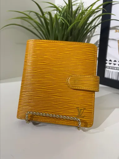35. Louis Vuitton Yellow Epi Compact Wallet