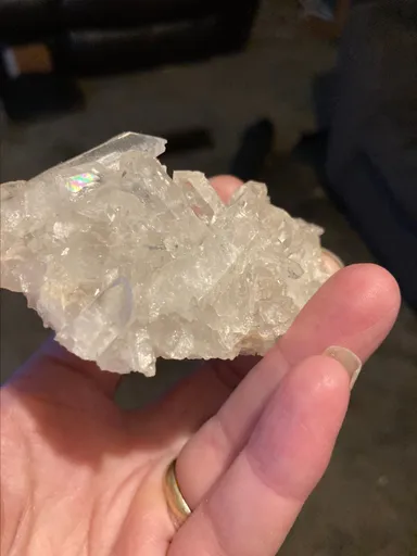 Clear quartz cluster with calcite and tons of points rainbows