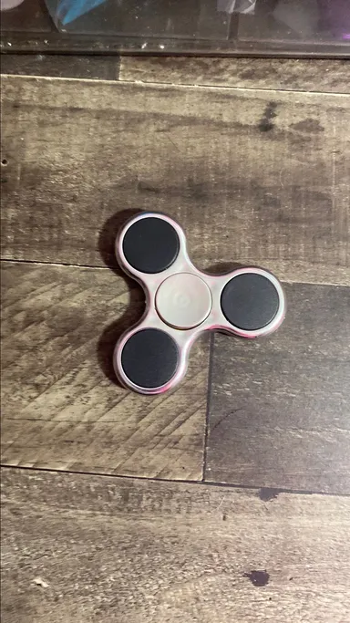 Silver and black fidget spinners