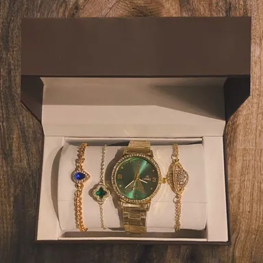 watch and three gold plated bracelet