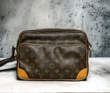 719.   LV Nile crossbody for Ms. Barbara only