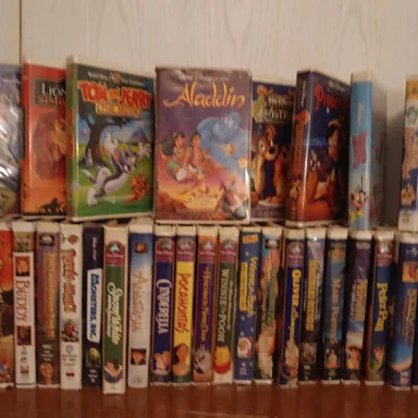 Disney VHS and Random Sealed DVDS