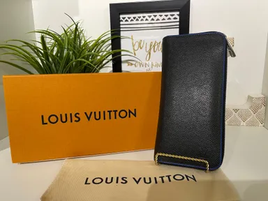 13. Louis Vuitton Black Taiga Zippy Wallet INCLUDES BOX & DUSTBAG