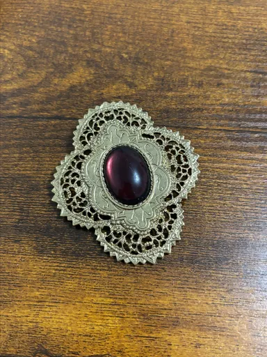 Gold Tone Lace Style with Purple Center Brooch