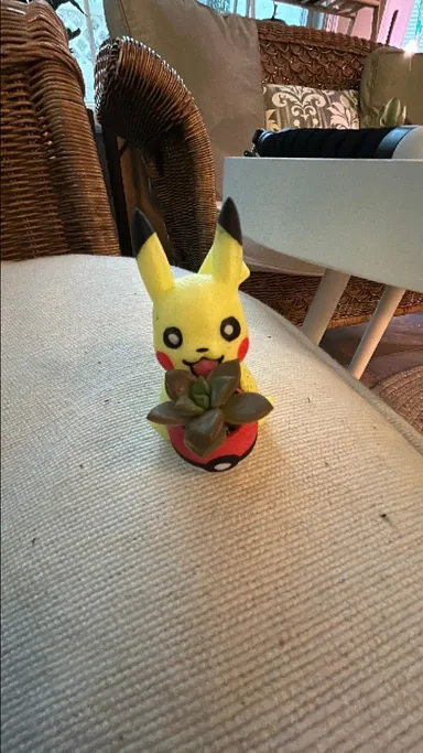 Tiny hand painted 3d printed pikachu