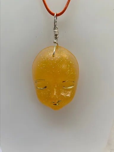 Resin face orange with some glow?!pendant!