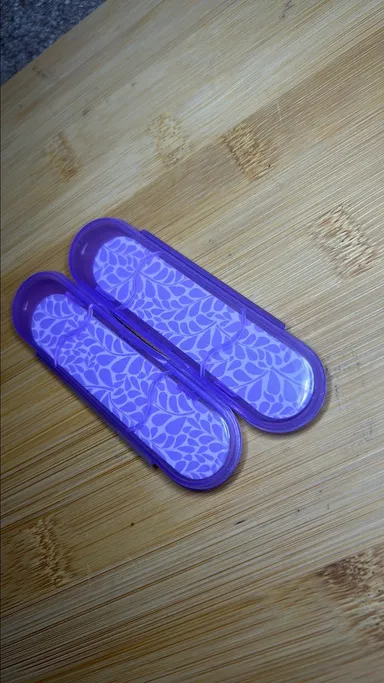 Set of 2 purple leaves  nail files in cases.