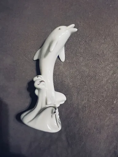 Small dolphin statue