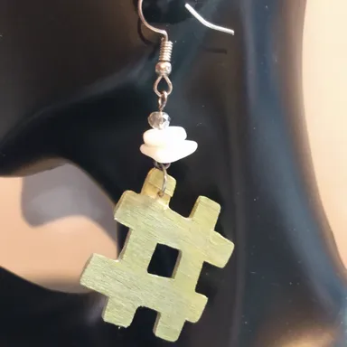 gold wood hashtag with shell and glass bead