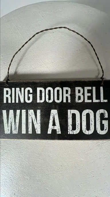 Wall or door hanging “Ring door bell win a dog” 3” x 6”