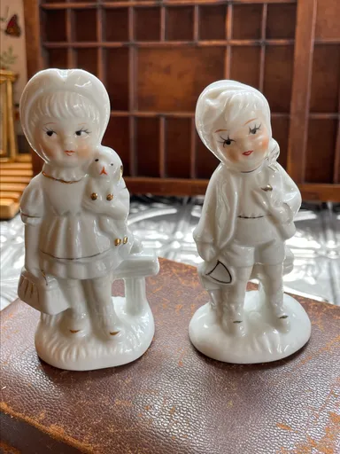 Two kid figurines Vtg