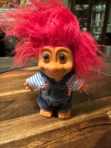 Vintage troll in overalls