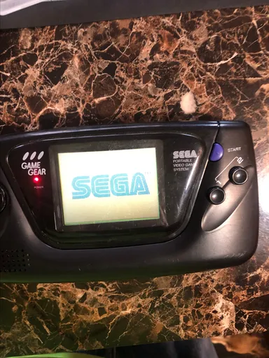 Sega game gear with 4 games