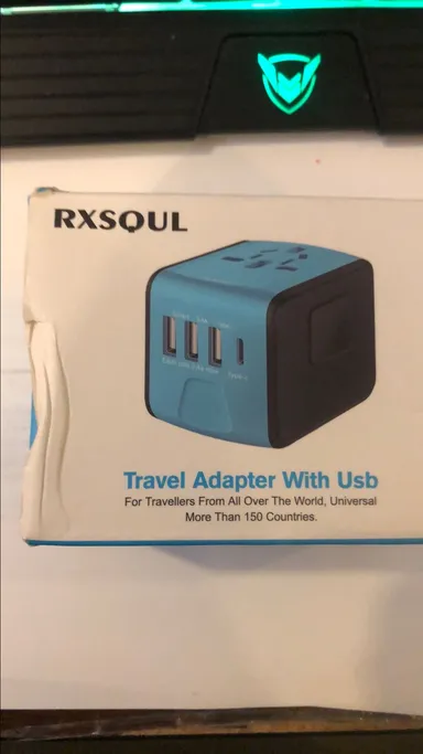 Rxsqul travel adapter with usb