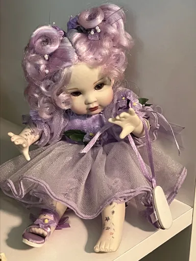 4. Porcelain Marie Osmond Little Doll Girl
