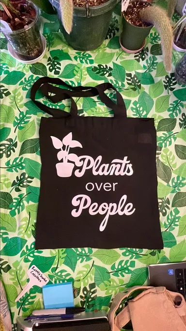 Plants Over People black tote bag