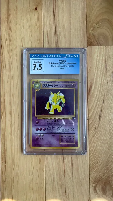 1997 The Mystery of the Fossils Hypno Holo CGC 7.5