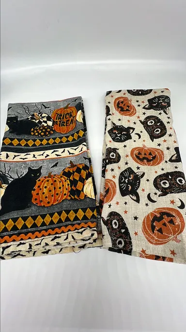 Two Halloween dish towels