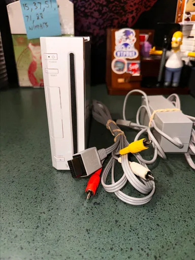Wii CONSOLE AND CABLES ONLY