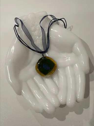 New Handcrafted Artisan fused glass pendant with coordinating ribbon and cord necklace.