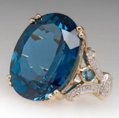 Goose Egg Shaped Blue Sapphire Ring (Size 7)