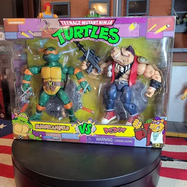 Teenage Mutant Ninja Turtles Michaelangelo vs Bebop Playmates Action Figure TMNT