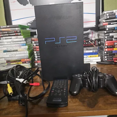 PS2 Fat with cables, controller, dvd remote, and memory card