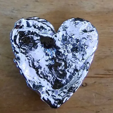 Hand poured heart 2 oz+ 0.999 silver
