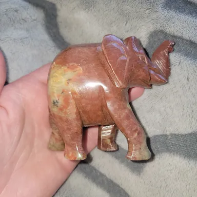 red soapstone or marble elephant